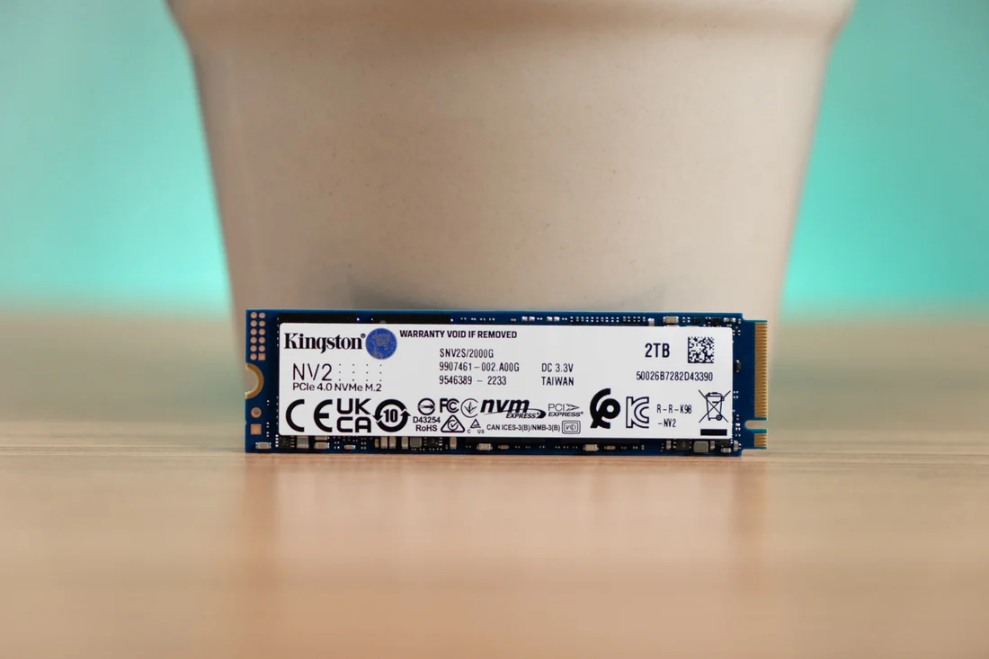 Kingston NV2 500GB Gen4 NVMe SSD — 3500 MB/s Laptop Upgrade — Kingston laptop side and angled view, buy in Lahore Pakistan