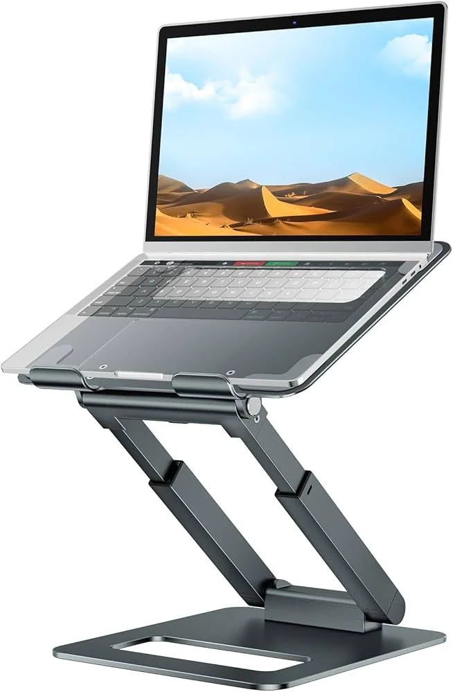 Foldable Ergonomic Laptop Stand 7 Height Adjustments Black — Generic laptop keyboard and ports view, Lahore Pakistan